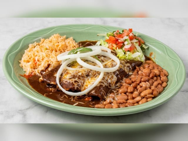 Two Enchiladas en Mole Sauce.